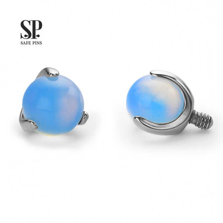 Opalite ball in paws (moonstone)